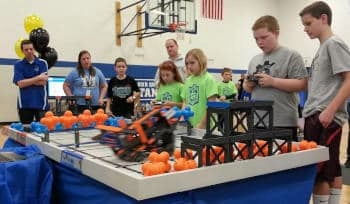 Students competing in a robotics competition